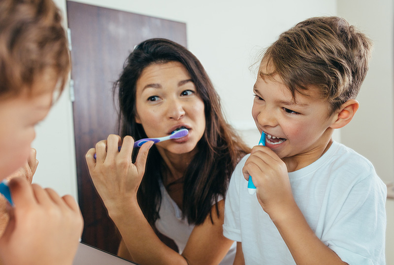 Dr. Aaron Tropmann & Dr. Gary Oyster  | Invisalign®, Intraoral Camera and Extractions