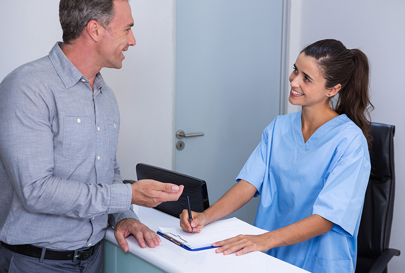 Dr. Aaron Tropmann & Dr. Gary Oyster  | Root Canals, Teeth Whitening and Dental Bridges