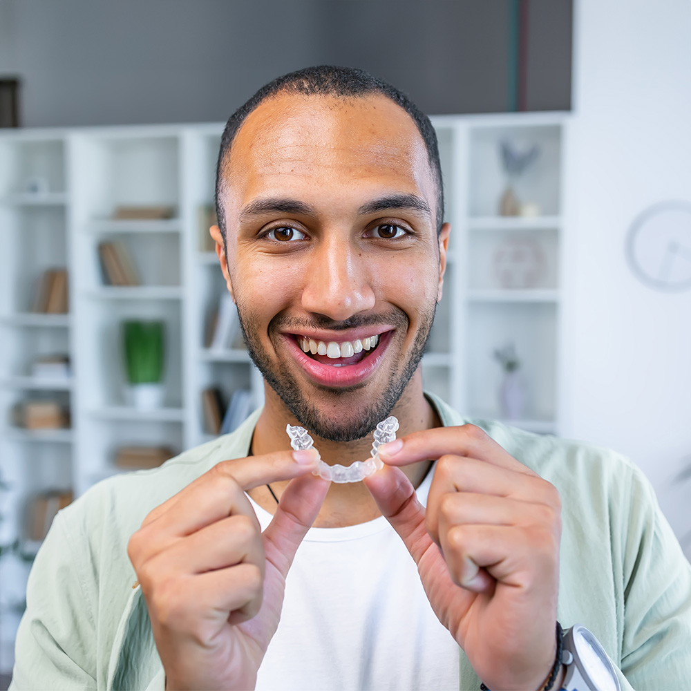 Dr. Aaron Tropmann   Dr. Gary Oyster  | Fluoride Treatment, Dental Cleanings and Ceramic Crowns